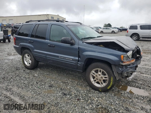 2004 Jeep Grand Cherokee Laredo with VIN 1J4GX48SX4C201569, listed as a Copart auction lot 58631585 with 271,124 mi miles and Salvage title. Bid and sale history available at DreamBid. Image 4.
