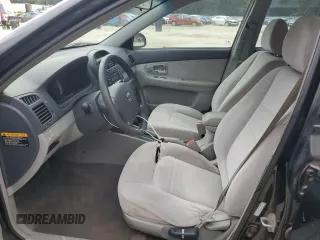 2007 Kia Spectra EX with VIN KNAFE121575466606, listed as a Copart auction lot 72697584 with 91,619 mi miles and Salvage Title. Bid and sale history available at carsss.com. Image 7.