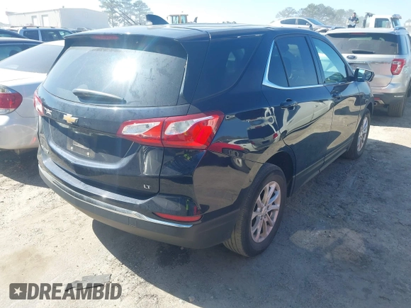 2020 Chevrolet Equinox LT with VIN 3GNAXKEV0LS702680, listed as a IAAI auction lot 41633024 with 63,041 mi miles and . Bid and sale history available at carsss.com. Image 4.