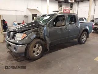 2005 Nissan Frontier LE with VIN 1N6AD07W95C451921, listed as a IAAI auction lot 40952064 with 234,900 mi miles and . Bid and sale history available at DreamBid. Image 2.