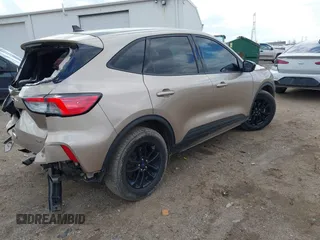 2020 Ford Escape SE Sport Hybrid with VIN 1FMCU0BZXLUC08683, listed as a IAAI auction lot 41882926 with 59,831 mi miles and . Bid and sale history available at DreamBid. Image 4.