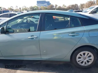 2022 Toyota Prius L Eco with VIN JTDKAMFU8N3188831, listed as a IAAI auction lot 42021222 with 39,629 mi miles and . Bid and sale history available at DreamBid. Image 15.