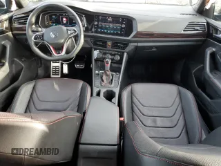 2023 Volkswagen Jetta GLI Autobahn z VIN 3VW2T7BU6PM001585, wystawiony jako Copart lot #82532014 z przebiegiem 24 556 mil mil oraz Szkoda całkowita • Salvage title. Historia ofert i sprzedaży dostępna na DreamBid. Obrazek 8.