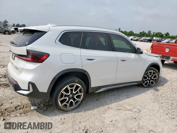 2023 BMW X1 xDrive28i with VIN WBX73EF06P5V77660, listed as a Copart auction lot 57342015 with 32,028 mi miles and Salvage title. Bid and sale history available at DreamBid. Image 3.