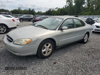 2003 Ford Taurus SE Standard with VIN 1FAFP53U53A141765, listed as a Copart auction lot 63980195 with 67,427 mi miles and Salvage title. Bid and sale history available at DreamBid. Image 1.