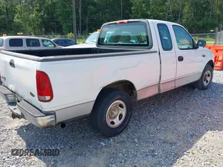 2003 Ford F-150 XL with VIN 1FTRX17203NB20937, listed as a IAAI auction lot 42396166 with 239,737 mi miles and . Bid and sale history available at DreamBid. Image 4.
