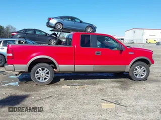2005 Ford F-150 XLT with VIN 1FTPX12555NB76674, listed as a IAAI auction lot 41371363 with 137,782 mi miles. Bid and sale history available at carsss.com. Image 14.