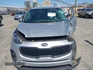 2019 Kia Sportage LX z VIN KNDPM3AC4K7591148, wystawiony jako IAAI lot #41826009 z przebiegiem Nie podano mil oraz . Historia ofert i sprzedaży dostępna na DreamBid. Obrazek 12.