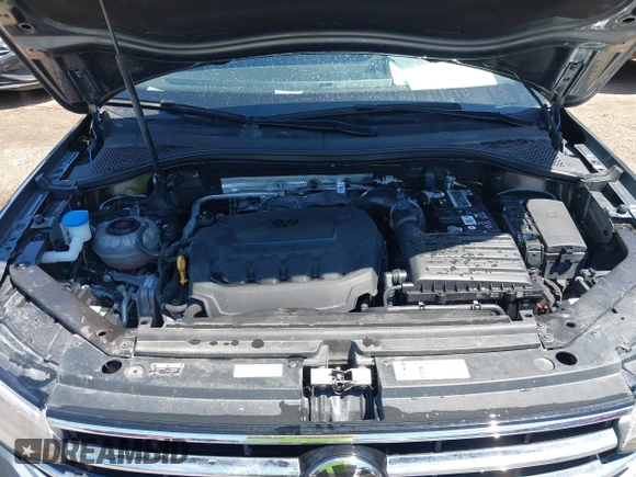 2023 Volkswagen Tiguan SE with VIN 3VVMB7AX4PM023080, listed as a IAAI auction lot 41963195 with 37,696 mi miles and . Bid and sale history available at DreamBid. Image 10.