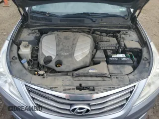 2015 Hyundai Azera z VIN KMHFG4JG7FA439963, wystawiony jako Copart lot #57679575 z przebiegiem 200 379 mil mil oraz Czysty tytuł • Clean title. Historia ofert i sprzedaży dostępna na DreamBid. Obrazek 11.