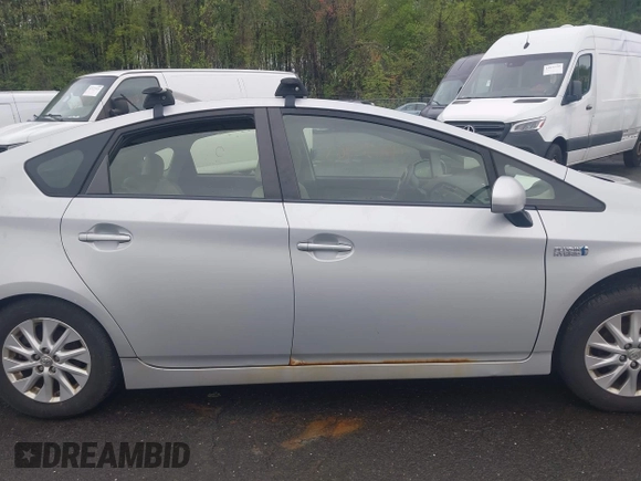 2012 Toyota Prius with VIN JTDKN3DP2C3004184, listed as a IAAI auction lot 42179963 with 210,815 mi miles and . Bid and sale history available at DreamBid. Image 13.