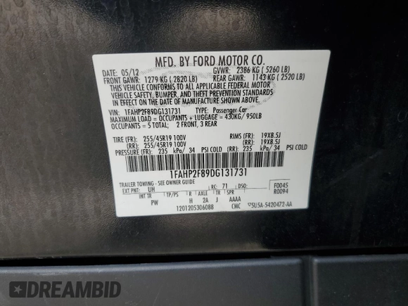 2013 Ford Taurus Limited with VIN 1FAHP2F89DG131731, listed as a Copart auction lot 48609065 with 116,975 mi miles and Salvage title. Bid and sale history available at DreamBid. Image 14.