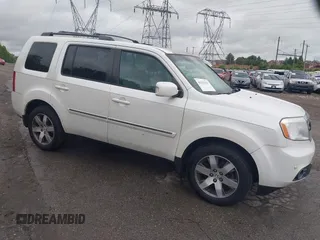 2014 Honda Pilot Touring z VIN 5FNYF4H95EB010298, wystawiony jako IAAI lot #42325234 z przebiegiem 98 753 mil mil oraz . Historia ofert i sprzedaży dostępna na DreamBid. Obrazek 1.