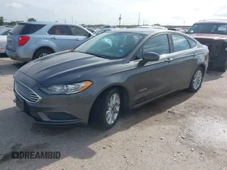2017 Ford Fusion Hybrid SE with VIN 3FA6P0LU5HR336779, listed as a IAAI auction lot 42691789 with 140,720 mi miles and . Bid and sale history available at DreamBid. Image 17.