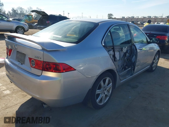 2004 Acura TSX w/Navigation with VIN JH4CL96944C002982, listed as a IAAI auction lot 41855710 with 165,129 mi miles. Bid and sale history available at carsss.com. Image 4.