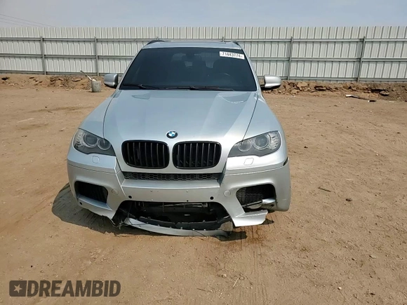 2011 BMW X5 M with VIN 5YMGY0C58BLK26357, listed as a Copart auction lot 71443774 with 116,973 mi miles and Salvage Title. Bid and sale history available at carsss.com. Image 12.