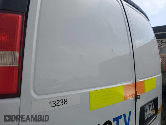2013 Chevrolet Express Cargo with VIN 1GCWGFCA4D1142736, listed as a IAAI auction lot 42854305 with 128,585 mi miles and . Bid and sale history available at DreamBid. Image 2.