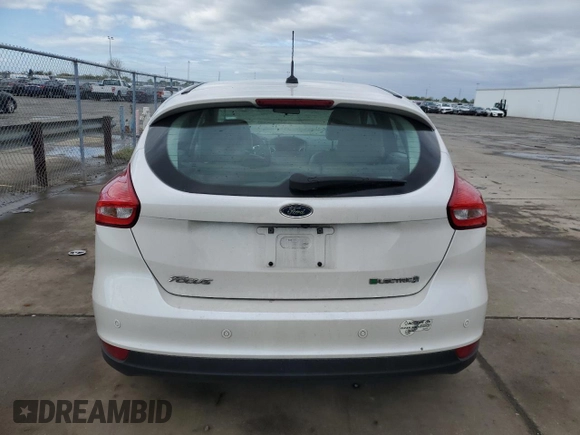 2015 Ford Focus Electric z VIN 1FADP3R46FL288088, wystawiony jako Copart lot #51020475 z przebiegiem 64 928 mil mil oraz Czysty tytuł • Clean title. Historia ofert i sprzedaży dostępna na DreamBid. Obrazek 6.