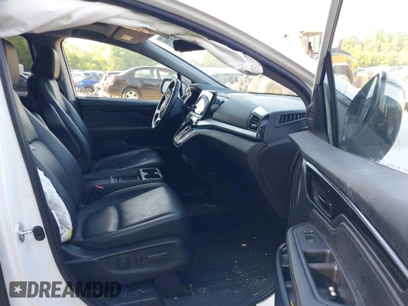 2022 Honda Odyssey Touring with VIN 5FNRL6H88NB026592, listed as a IAAI auction lot 42367048 with 57,066 mi miles and . Bid and sale history available at DreamBid. Image 5.