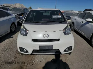 2015 Scion iQ with VIN JTNJJXB09FJ030846, listed as a Copart auction lot 88353405 with 72,208 mi miles and Salvage Title. Bid and sale history available at carsss.com. Image 5.