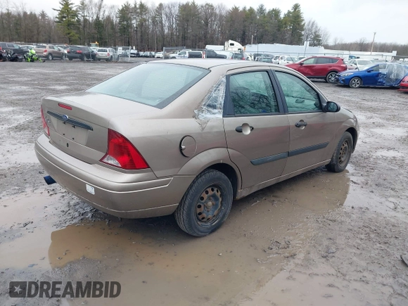2003 Ford Focus LX with VIN 1FAFP33P33W267575, listed as a IAAI auction lot 41804406 with 106,957 mi miles and . Bid and sale history available at carsss.com. Image 4.