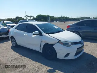 2015 Toyota Corolla L with VIN 2T1BURHE1FC252615, listed as a IAAI auction lot 41884936 with 113,805 mi miles and . Bid and sale history available at DreamBid. Image 1.