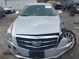 2018 Cadillac ATS Luxury RWD z VIN 1G6AB5RX6J0110860, wystawiony jako IAAI lot #41556662 z przebiegiem 63 886 mil mil oraz . Historia ofert i sprzedaży dostępna na DreamBid. Obrazek 13.
