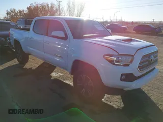 2016 Toyota Tacoma SR5 with VIN 5TFDZ5BN3GX009600, listed as a IAAI auction lot 41214680 with 100,174 mi miles and . Bid and sale history available at DreamBid. Image 1.