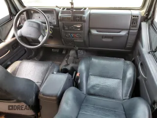 2001 Jeep Wrangler Sport с VIN 1J4FA49S41P353878, выставлен на аукционе Copart как лот 64637385 с пробегом 166 642 миль миль и Списание • Salvage title. История ставок и продаж доступна на DreamBid. Изображение 8.