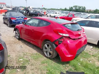 2012 Hyundai Veloster w/Black Int with VIN KMHTC6AD7CU049570, listed as a IAAI auction lot 42265051 with 79,896 mi miles and . Bid and sale history available at DreamBid. Image 3.