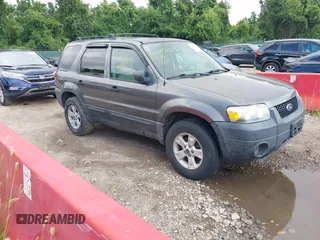 2006 Ford Escape XLT with VIN 1FMCU93106KA37648, listed as a IAAI auction lot 42719362 with 184,321 mi miles and . Bid and sale history available at DreamBid. Image 1.