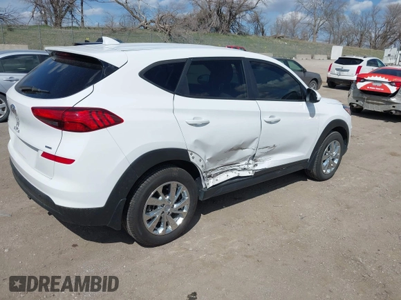 2019 Hyundai Tucson SE with VIN KM8J2CA43KU870933, listed as a IAAI auction lot 41972884 with 53,029 mi miles. Bid and sale history available at carsss.com. Image 4.