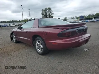 2000 Pontiac Firebird Firebird z VIN 2G2FS22K6Y2143127, wystawiony jako Copart lot #72041384 z przebiegiem 181 787 mil mil oraz Szkoda całkowita • Salvage title. Historia ofert i sprzedaży dostępna na DreamBid. Obrazek 2.
