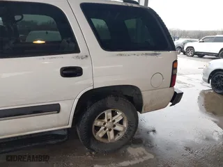 2004 Chevrolet Tahoe LT with VIN 1GNEC13ZX4J131652, listed as a IAAI auction lot 41551921 with 395,802 mi miles. Bid and sale history available at carsss.com. Image 6.