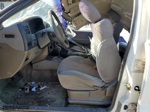 1998 Kia Sportage with VIN KNDJB7232W5569054, listed as a Copart auction lot 82756824 with 106,550 mi miles and Salvage Title. Bid and sale history available at carsss.com. Image 7.