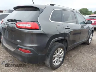 2015 Jeep Cherokee Latitude with VIN 1C4PJLCB6FW547788, listed as a IAAI auction lot 42177621 with 138,945 mi miles and . Bid and sale history available at carsss.com. Image 4.