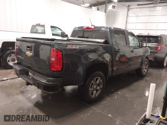 2020 Chevrolet Colorado 4WD Z71 with VIN 1GCGTDEN1L1163546, listed as a IAAI auction lot 41706719 with 64,662 mi miles and . Bid and sale history available at DreamBid. Image 4.
