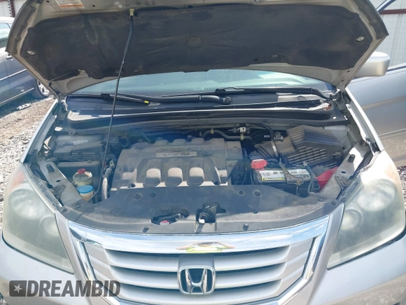 2009 Honda Odyssey Touring z VIN 5FNRL38999B052244, wystawiony jako IAAI lot #42085003 z przebiegiem 269 402 mil mil oraz . Historia ofert i sprzedaży dostępna na DreamBid. Obrazek 10.