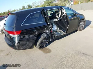 2015 Honda Odyssey Touring Elite with VIN 5FNRL5H93FB065594, listed as a IAAI auction lot 41826693 with 94,632 mi miles. Bid and sale history available at carsss.com. Image 4.