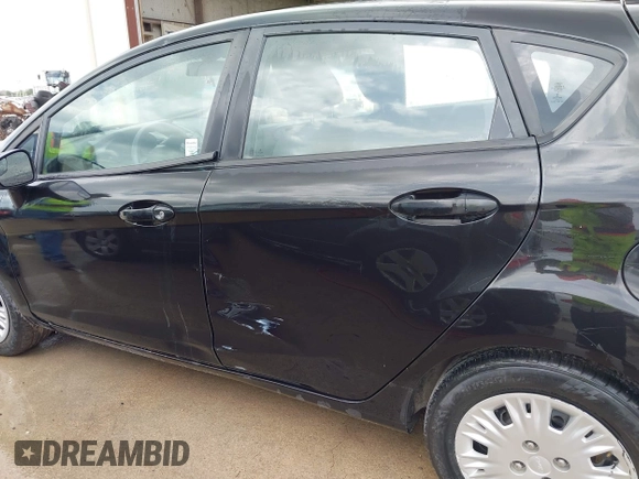 2015 Ford Fiesta S with VIN 3FADP4TJ6FM149534, listed as a IAAI auction lot 42415678 with 55,127 mi miles and . Bid and sale history available at DreamBid. Image 6.