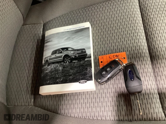2019 Ford F-150 XL z VIN 1FTEW1CB4KFC20443, wystawiony jako IAAI lot #42806612 z przebiegiem 56 767 mil mil oraz . Historia ofert i sprzedaży dostępna na DreamBid. Obrazek 7.
