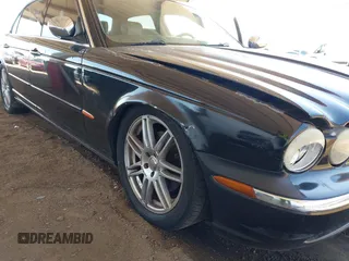 2005 Jaguar XJ Vanden Plas z VIN SAJWA82C05SG47589, wystawiony jako IAAI lot #42409697 z przebiegiem 222 598 mil mil oraz . Historia ofert i sprzedaży dostępna na DreamBid. Obrazek 6.