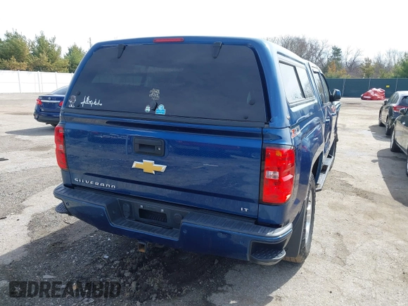 2017 Chevrolet Silverado 1500 LT with VIN 3GCUKREC5HG363503, listed as a IAAI auction lot 41833304 with 133,130 mi miles and . Bid and sale history available at DreamBid. Image 4.