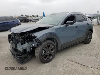2025 Mazda CX-30 S Carbon Edition z VIN 3MVDMBCM4SM795696, wystawiony jako Copart lot #55825875 z przebiegiem 1 032 mil mil oraz Szkoda całkowita • Salvage title. Historia ofert i sprzedaży dostępna na DreamBid. Obrazek 1.