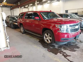 2015 Chevrolet Suburban LT with VIN 1GNSKJKC8FR619991, listed as a IAAI auction lot 41642390 with 248,364 mi miles and . Bid and sale history available at DreamBid. Image 1.