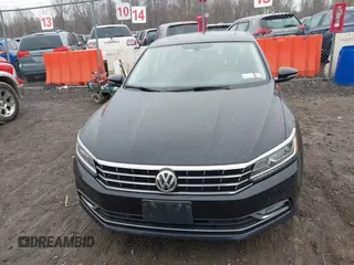 2017 Volkswagen Passat SE z VIN 1VWGT7A30HC031442, wystawiony jako IAAI lot #42008142 z przebiegiem 171 069 mil mil oraz . Historia ofert i sprzedaży dostępna na DreamBid. Obrazek 13.