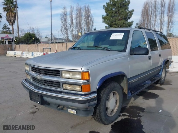 1997 Chevrolet Suburban with VIN 1GNFK16R2VJ365448, listed as a IAAI auction lot 41689906 with 228,151 mi miles. Bid and sale history available at carsss.com. Image 2.