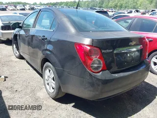2013 Chevrolet Sonic LT with VIN 1G1JC5SH6D4201811, listed as a IAAI auction lot 42082122 with 212,944 mi miles and . Bid and sale history available at DreamBid. Image 3.
