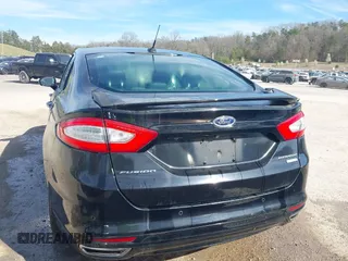 2016 Ford Fusion Titanium with VIN 3FA6P0K92GR284491, listed as a IAAI auction lot 41824323 with 148,016 mi miles. Bid and sale history available at carsss.com. Image 16.