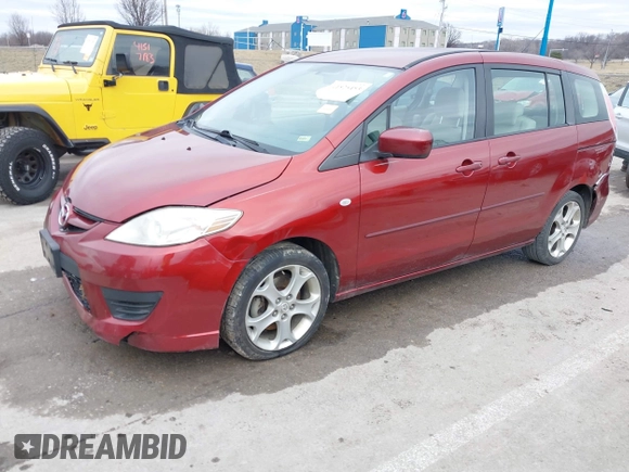 2009 Mazda Mazda5 Sport with VIN JM1CR293X90339440, listed as a IAAI auction lot 41525453 with 173,640 mi miles. Bid and sale history available at carsss.com. Image 2.